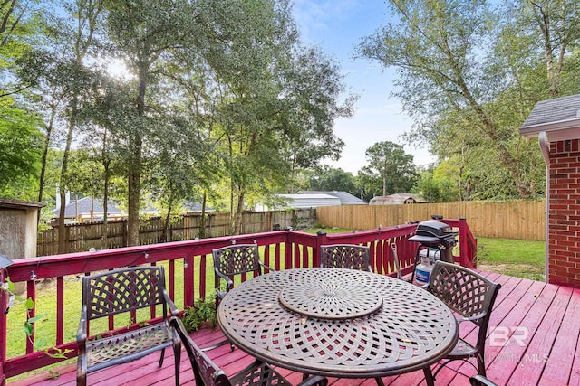 deck featuring a lawn