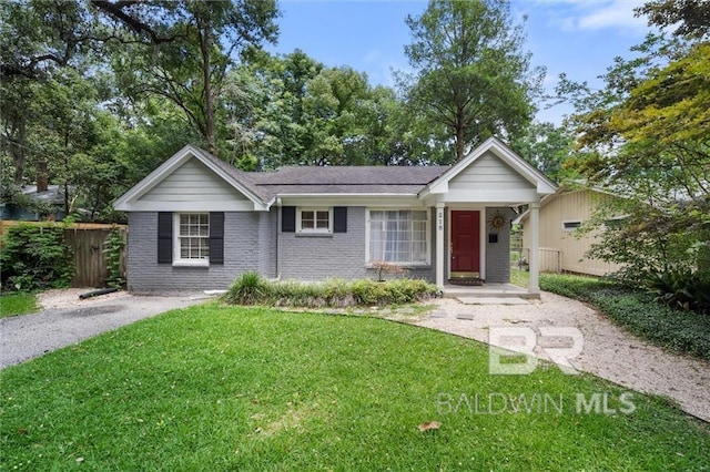 ranch-style house with a front lawn