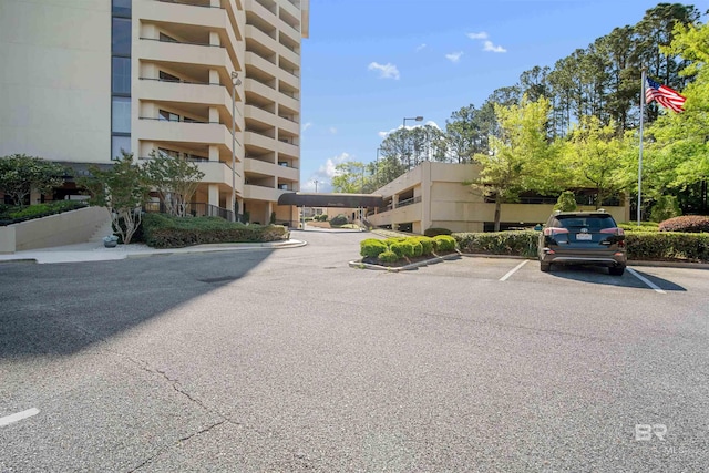 view of property with uncovered parking
