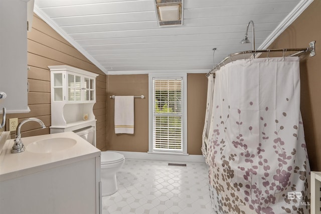 20011 Lawrence Rd, Fairhope, AL 36532 - full bathroom with toilet, vanity, wooden walls, baseboards, and a shower with curtain