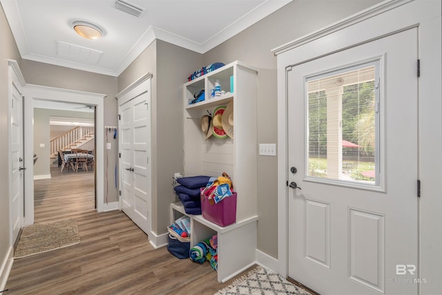 20011 Lawrence Rd, Fairhope, AL 36532 - mudroom featuring wood finished floors, ornamental molding, and baseboards
