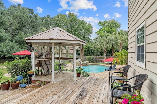 20011 Lawrence Rd, Fairhope, AL 36532 - wooden terrace featuring a gazebo, a fenced backyard, a pool with connected hot tub, and view of scattered trees