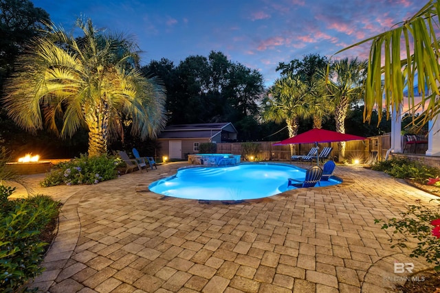 20011 Lawrence Rd, Fairhope, AL 36532 - view of swimming pool with a patio, a jacuzzi, and a fenced backyard