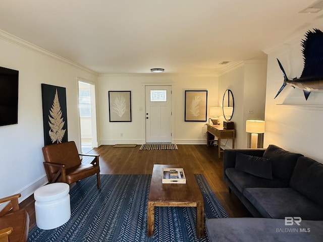 living room featuring dark wood-type flooring and ornamental molding