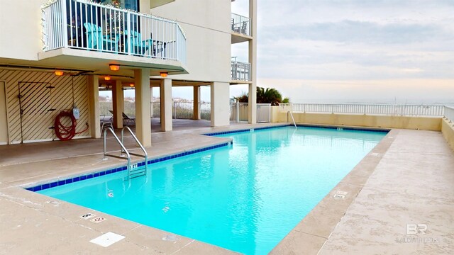 view of pool with a patio