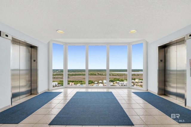 unfurnished sunroom with elevator