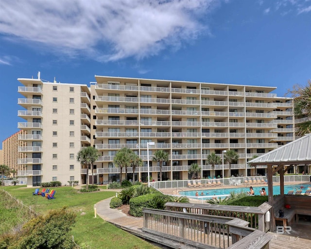 view of property with a community pool