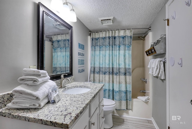 full bath with shower / bathtub combination with curtain, toilet, a textured ceiling, vanity, and wood finished floors