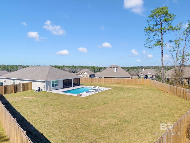 view of yard with a patio area and a fenced backyard