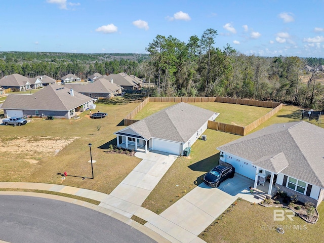 aerial view featuring a view of trees