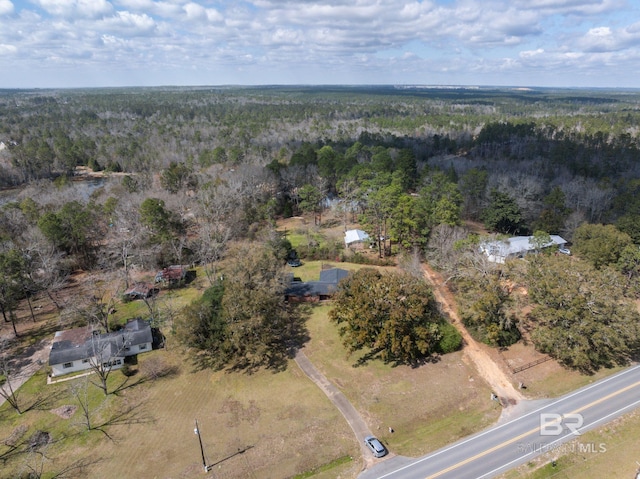 aerial view featuring a forest view