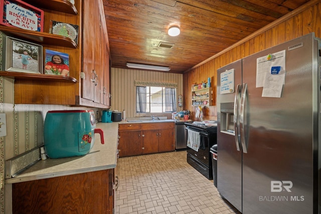 kitchen with wood walls, wood ceiling, light countertops, brown cabinets, and stainless steel appliances