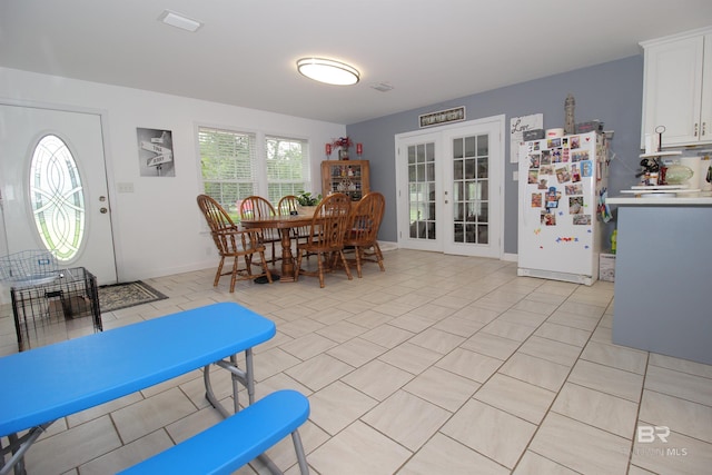 tiled dining area with french doors