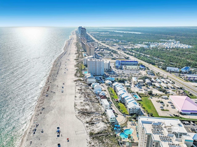 aerial view featuring a water view and a beach view