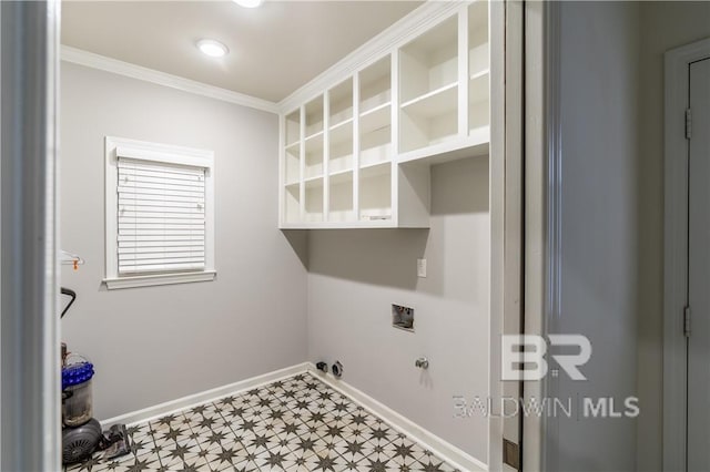 clothes washing area with crown molding, hookup for a washing machine, and gas dryer hookup