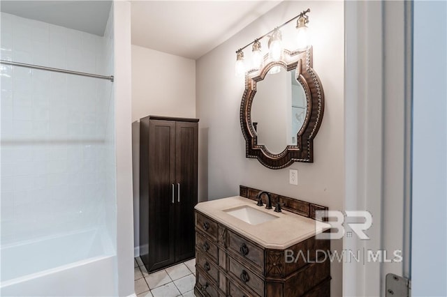 bathroom with tile patterned floors, vanity, and shower / bathing tub combination