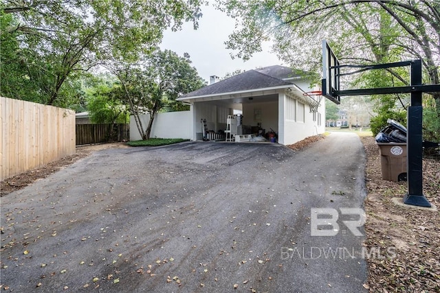 exterior space with basketball hoop