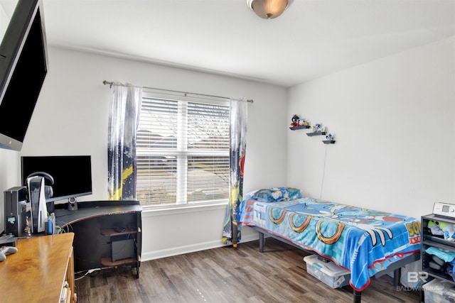 bedroom featuring hardwood / wood-style floors