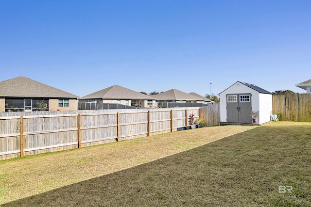 view of yard with a storage shed