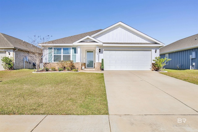 view of front facade with a garage and a front lawn