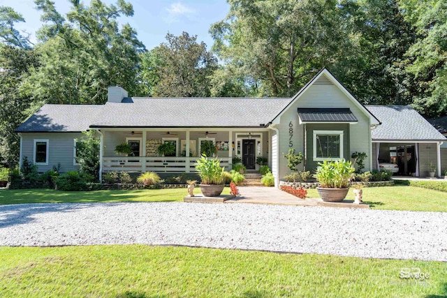 view of front of house with a front lawn and covered porch