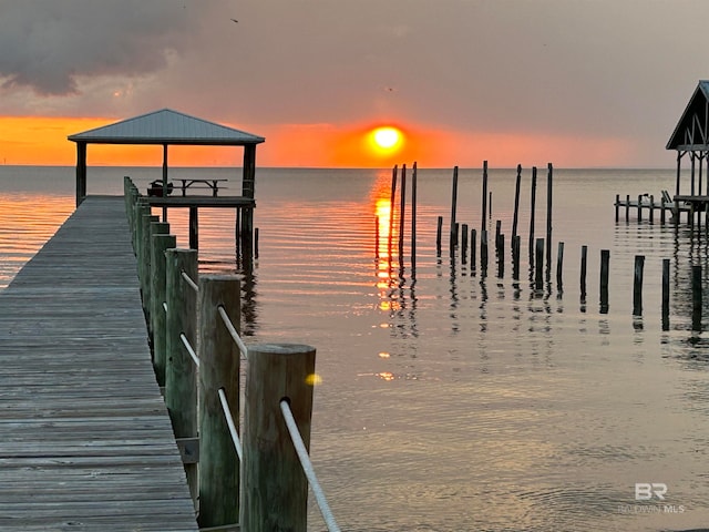 dock area featuring a water view