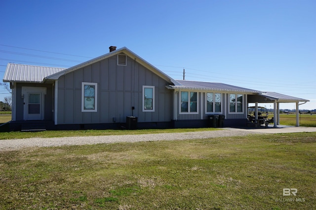 exterior space featuring a front lawn