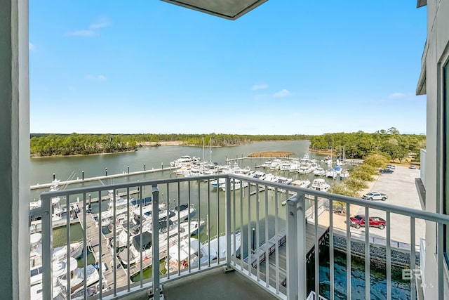 balcony featuring a water view