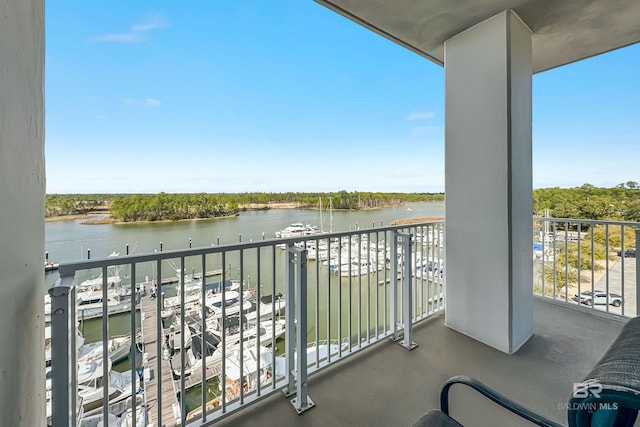 balcony featuring a water view