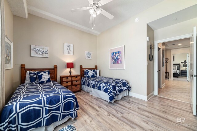 bedroom featuring ceiling fan and wood-type flooring