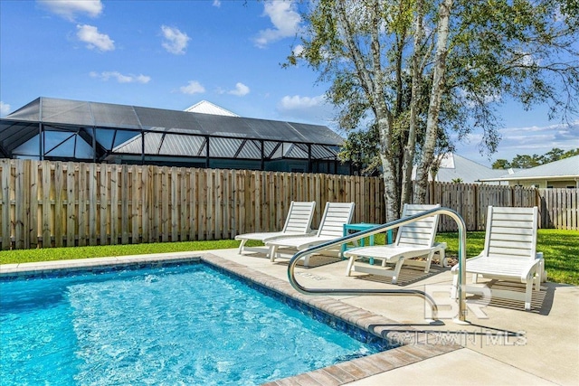 view of swimming pool with a fenced backyard, a patio, and a fenced in pool