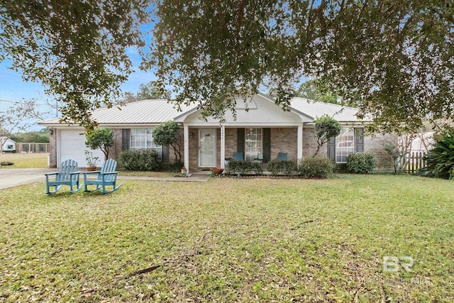 ranch-style house with a front yard and a garage