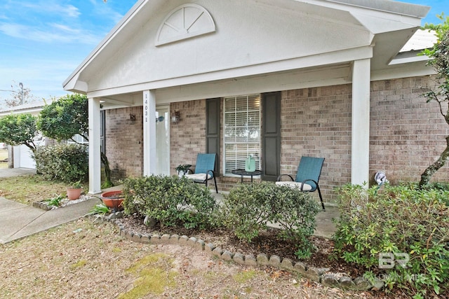 doorway to property with covered porch