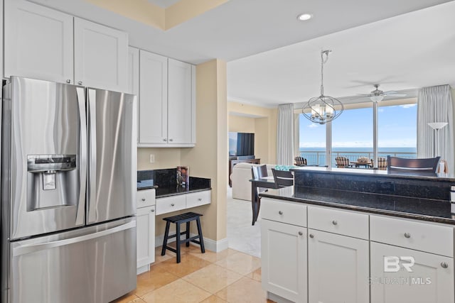 13621 Perdido Key Dr Unit 1804W, Perdido Key, FL 32507 - kitchen featuring stainless steel refrigerator with ice dispenser, pendant lighting, ceiling fan with notable chandelier, light tile patterned floors, and white cabinetry
