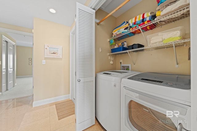 13621 Perdido Key Dr Unit 1804W, Perdido Key, FL 32507 - laundry room featuring light tile patterned flooring and washer and clothes dryer