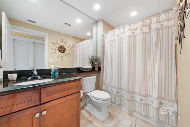 13621 Perdido Key Dr Unit 1804W, Perdido Key, FL 32507 - bathroom featuring tile patterned floors, toilet, vanity, and a shower with shower curtain
