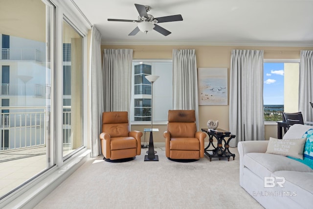 13621 Perdido Key Dr Unit 1804W, Perdido Key, FL 32507 - living area featuring ceiling fan, ornamental molding, and carpet flooring
