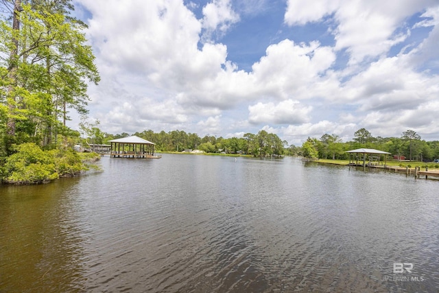 property view of water with a gazebo