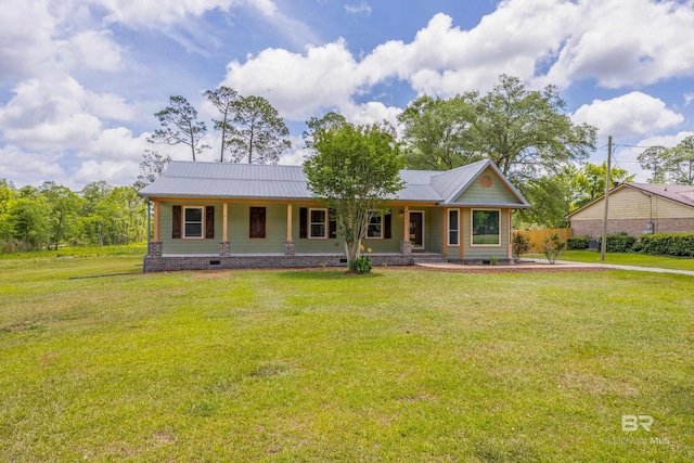 view of front of home featuring a porch, a front yard, metal roof, and crawl space