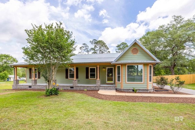 view of front of house featuring a front lawn, a porch, crawl space, and fence