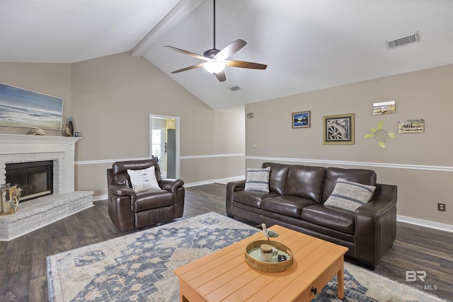 living area with wood finished floors, a ceiling fan, beam ceiling, visible vents, and baseboards