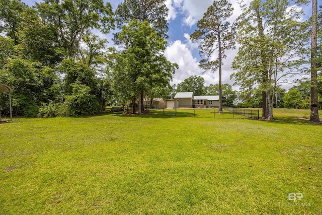 view of yard with fence