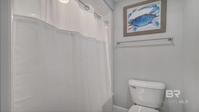 bathroom featuring toilet