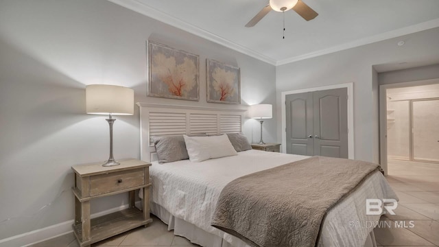 bedroom with a closet, ceiling fan, light tile floors, and crown molding