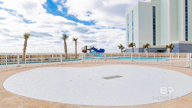 view of home's community featuring a playground