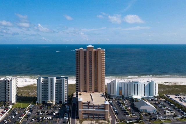 aerial view featuring a view of the beach and a water view