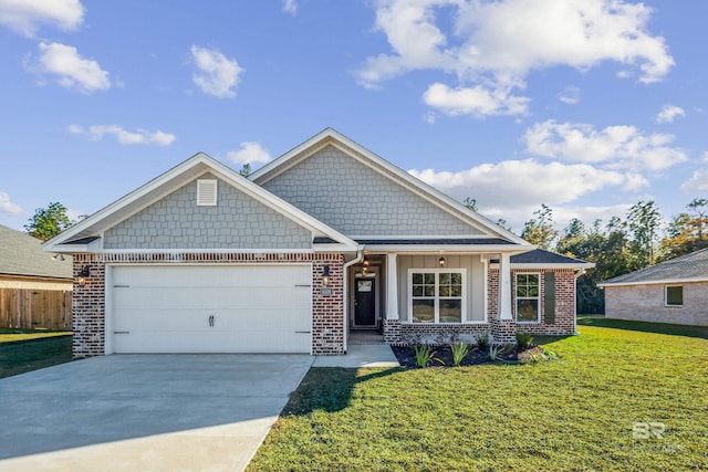 craftsman house with a garage and a front lawn