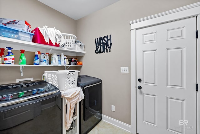 washroom featuring independent washer and dryer