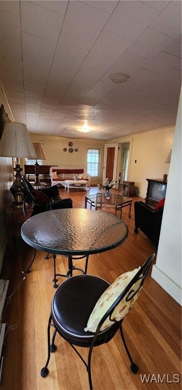 dining area featuring wood-type flooring