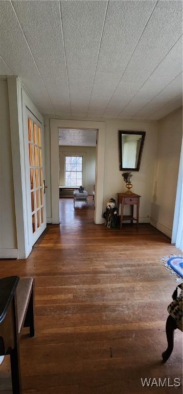 hall featuring hardwood / wood-style flooring